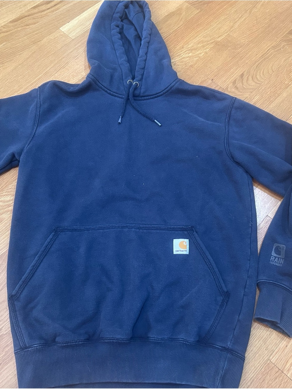 Carhartt rain defender hoodie in men’s size small and navy blue color